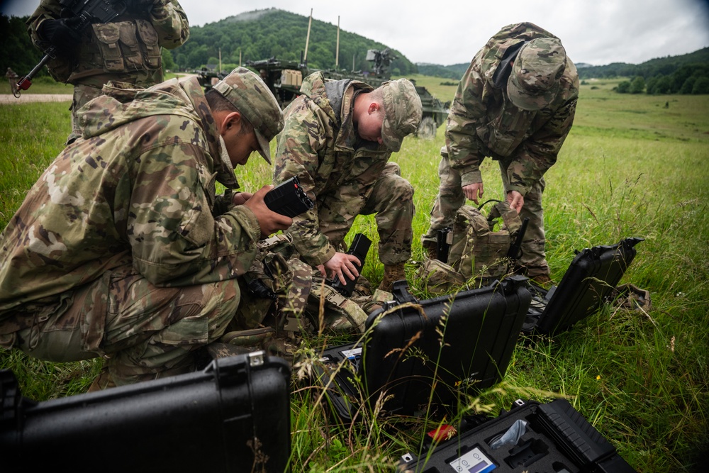 U.S. Soldiers set up Wingman and Pitbull portable counter-unmanned aerial system devices during Project Flytrap at Hohenfels Training Area, Germany