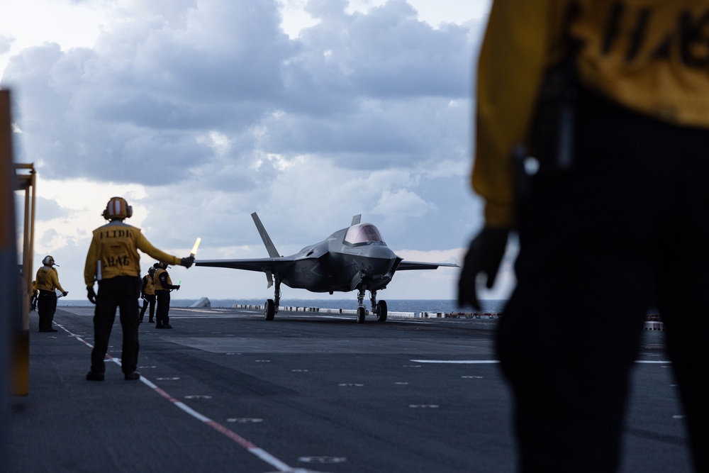 F-35B Lightning II prepares for takeoff during night flight operations aboard USS America in the Coral Sea
