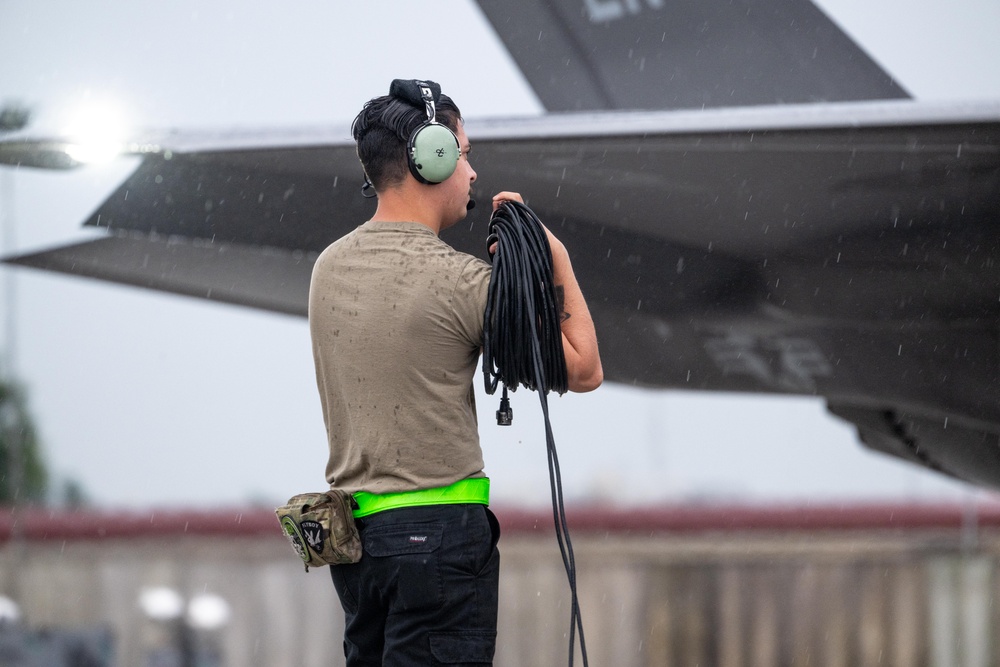 U.S. Air Force crew chief performs pre-flight inspections on F-35A Lightning II during exercise Combined Strike 25