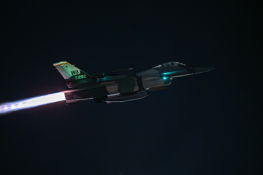 U.S. Air Force F-16 in flight during night operations