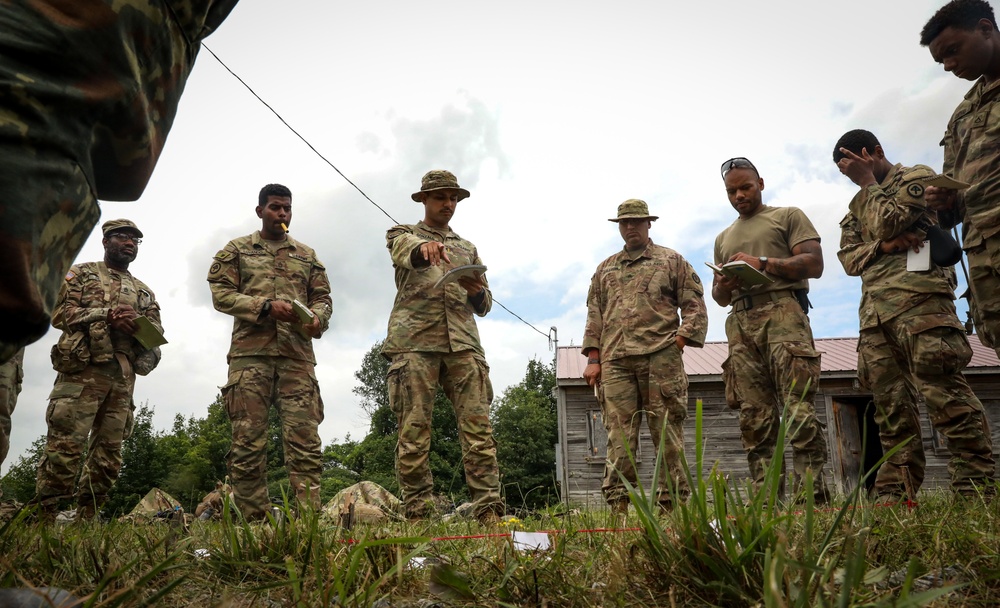 U.S. Army soldiers planning convoy operations during training exercise
