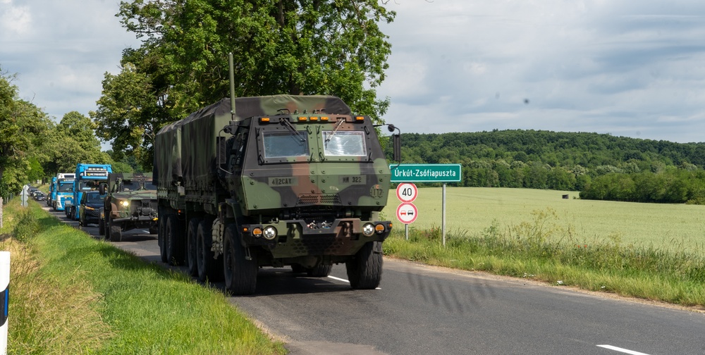 U.S. Army vehicles convoy through Hungary during Saber Guardian exercise
