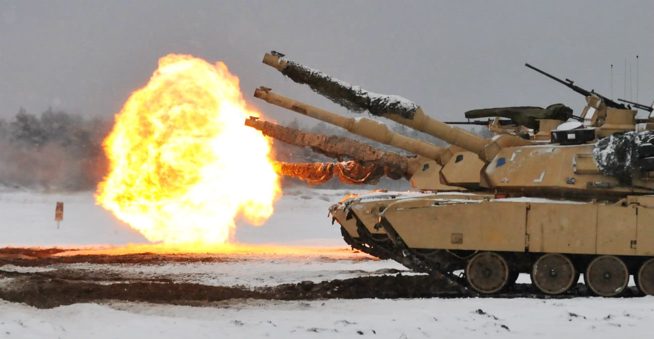 Battle tanks firing rounds