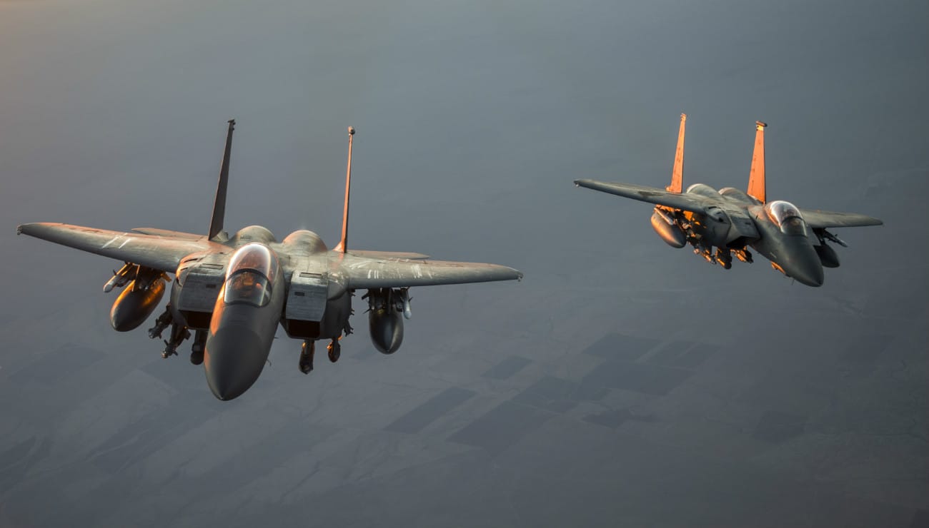 F-15 Eagles aircraft sunrise