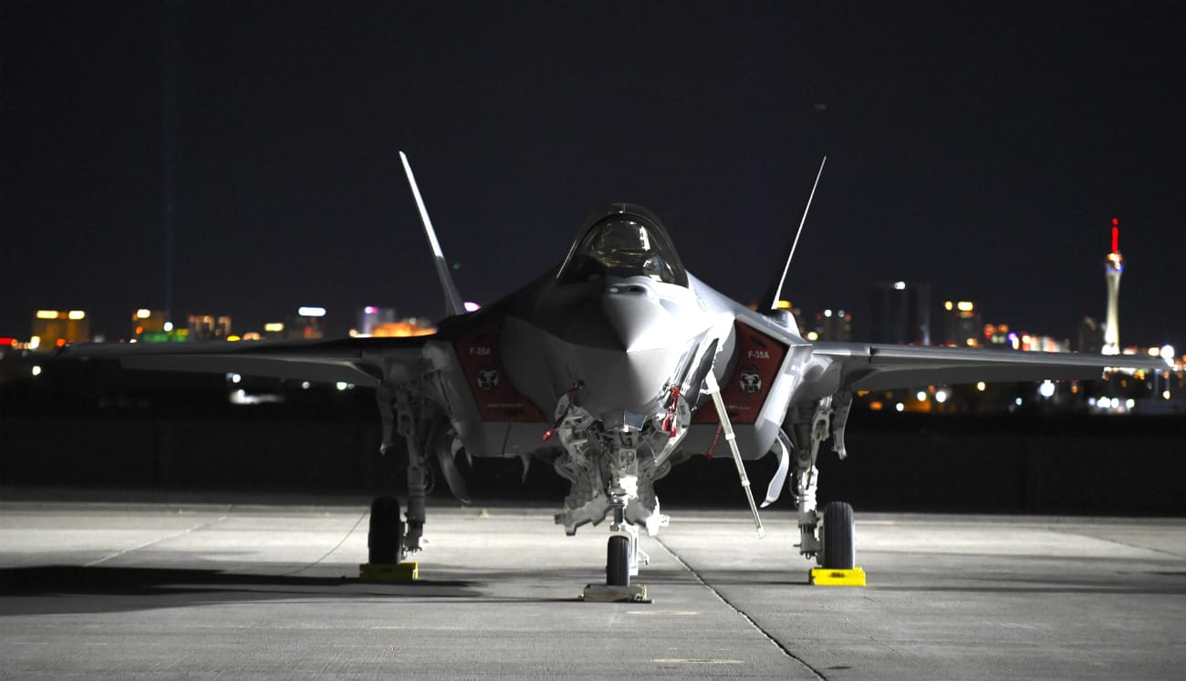 US Military Aircraft at Night Images - F-35A Lightning II sitting on the flight line