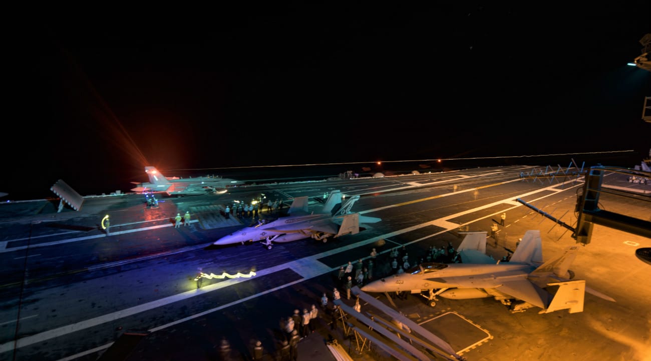 US Military Aircraft at Night Images - FA-18E Super Hornet launching from the flight deck