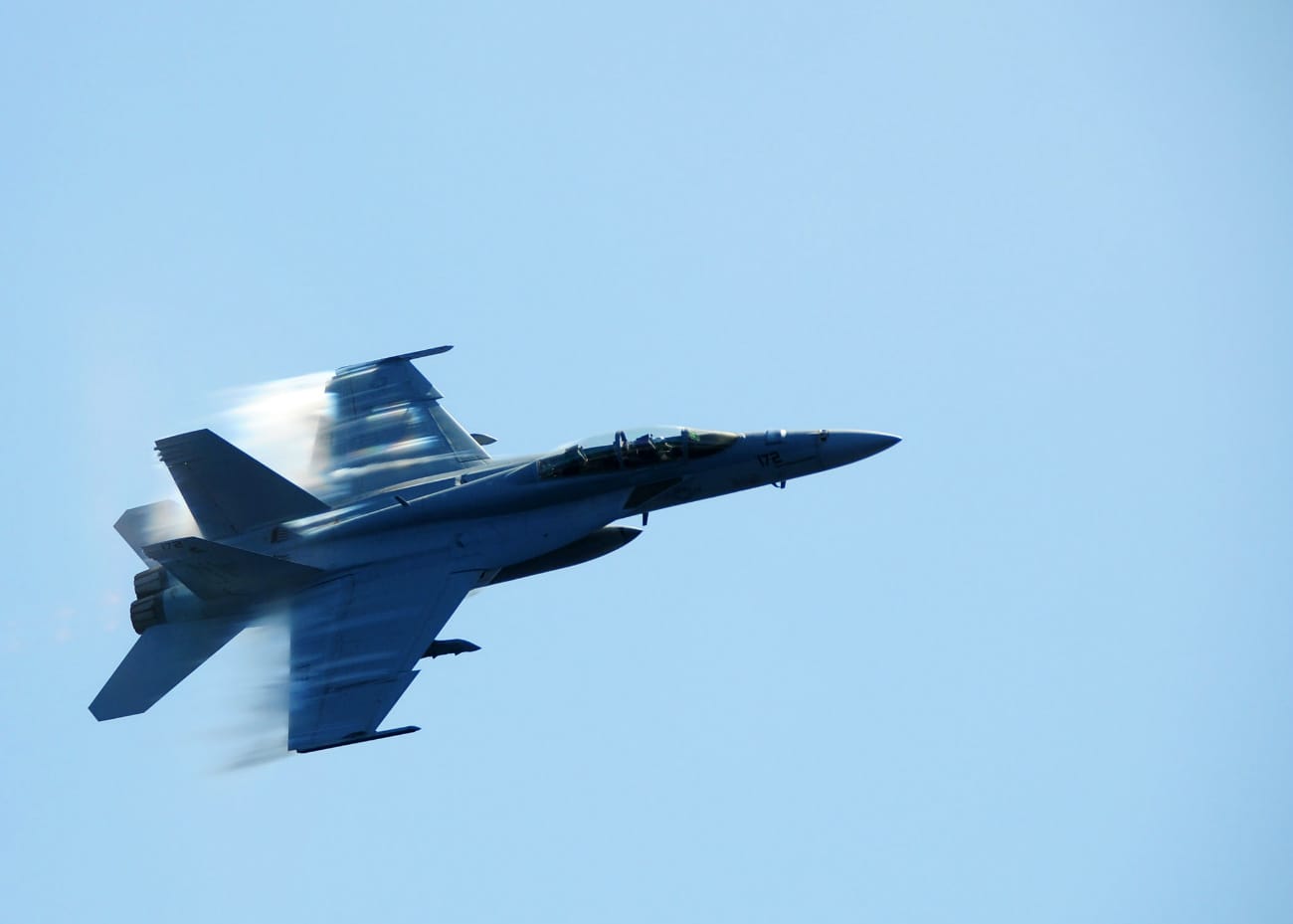 Sound Barrier Breaking Images, FA-18F Super Hornet breaks the sound barrier during a fly-by of USS Ronald Reagan